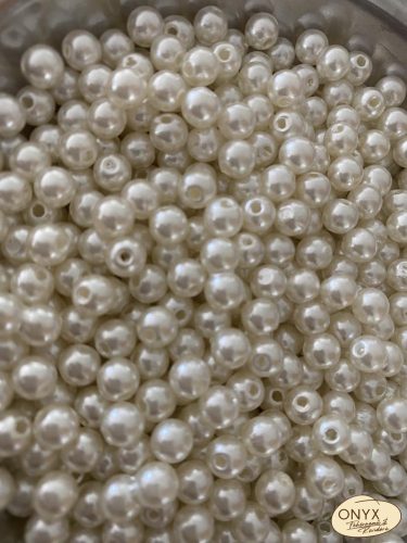 Műanyag tekla gyöngy 12mm átfúrt 